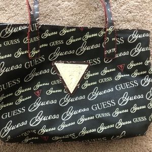 Black Guess tote with pink and white accent